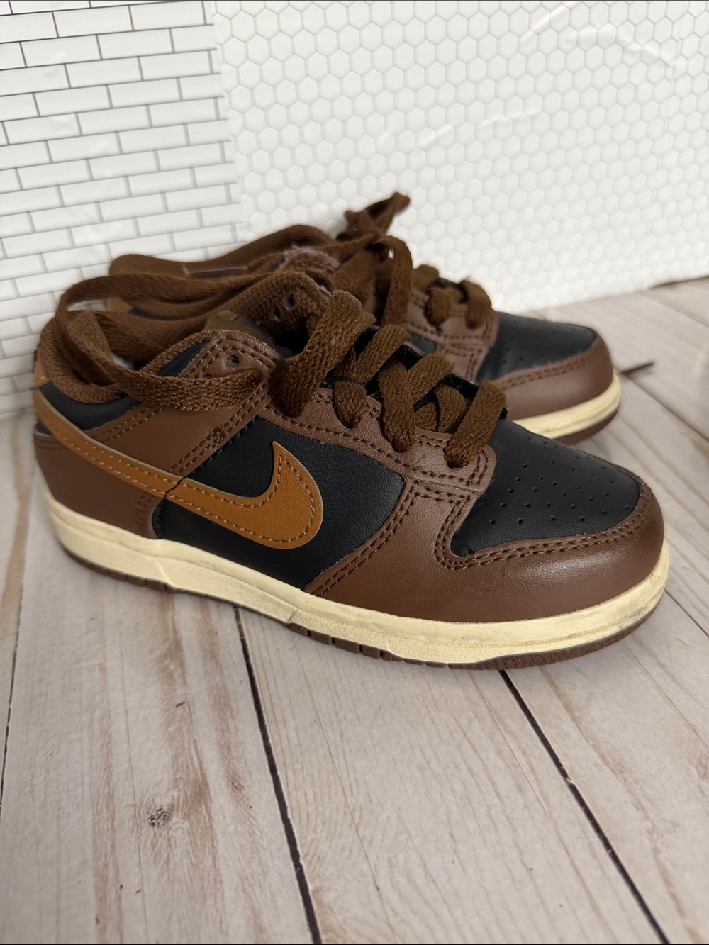 Nike Kids Brown and Black Low-Top Sneakers with Tan Swoosh